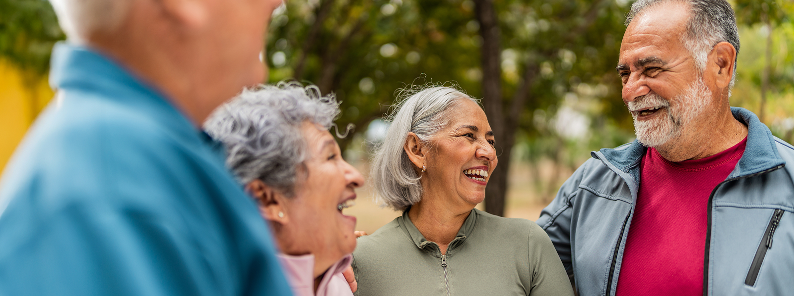 Group of elderly people smiling and laughing
