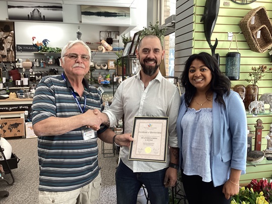 Glen Jones with proprieters Kyle and Alica Pettinger of branch preferred partner, Mil-Jeanne's Flowers & Axcenz.