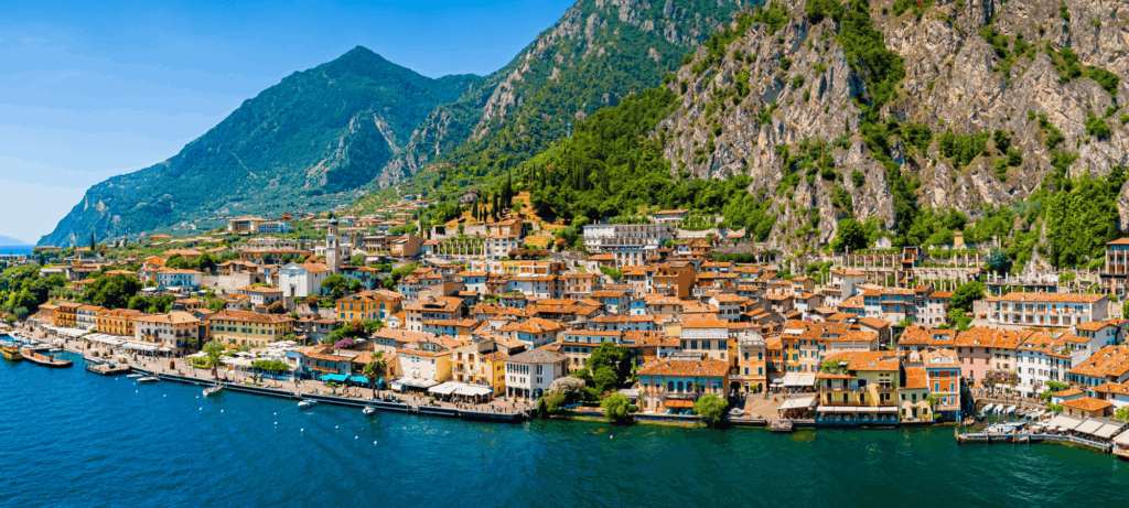 Italy’s Lake Garda, surrounded by turquoise water and dramatic cliffs.